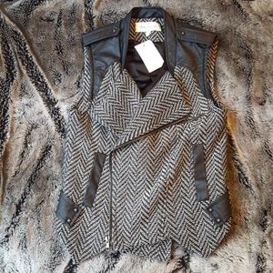 Black and white moto vest w/ faux leather details